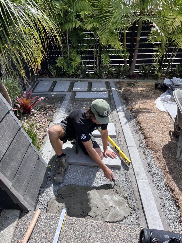 Designer refining landscape layout drawings